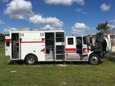 Passenger side with all the lockers and doors open Truck