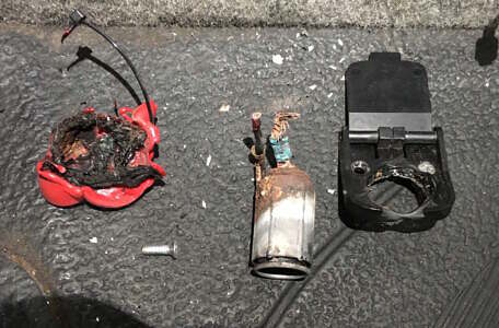 Damaged 12V outlet disassembled Electrical short damage