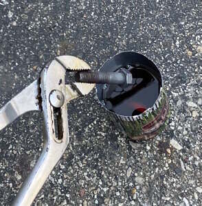 Blueing heated bolt with a dip in motor oil