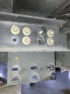 Rear bumper mounting plate and chassis frame